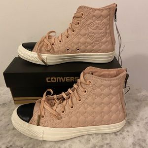 Pink Converse Chuck Taylor leather high top